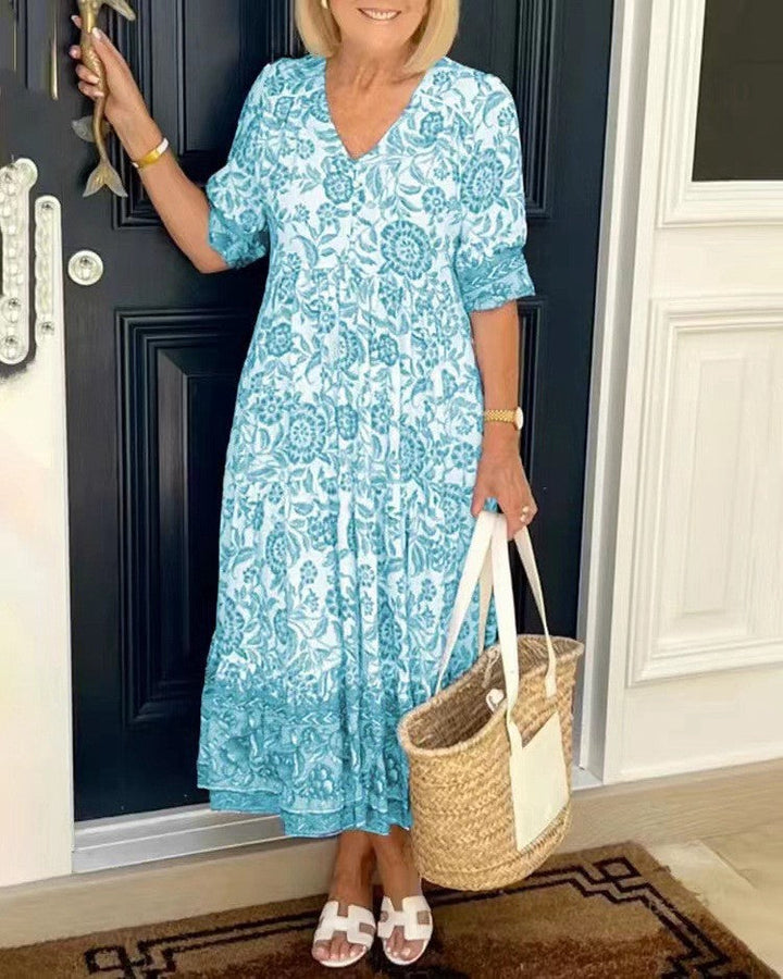 Damska elegancka sukienka floral z dekoltem V | Midi