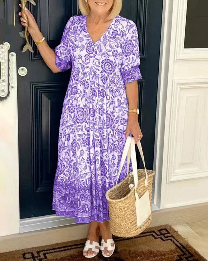 Damska elegancka sukienka floral z dekoltem V | Midi